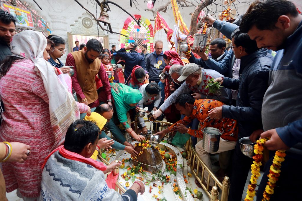 Devotees perform ritual on the occasion of Maha Shivratri festival