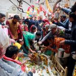 Devotees perform ritual on the occasion of Maha Shivratri festival