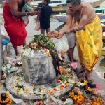 Devotees perform ritual on the occasion of Maha Shivratri festival on the bank of river ganga