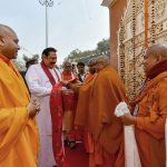 Sri Lankan Prime Minister Mahinda Rajapaksa pose for a photograph during his visit to world heritage Mahabodhi Temple