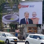 An artist makes graffiti showing a picture of USA President Donald Trump