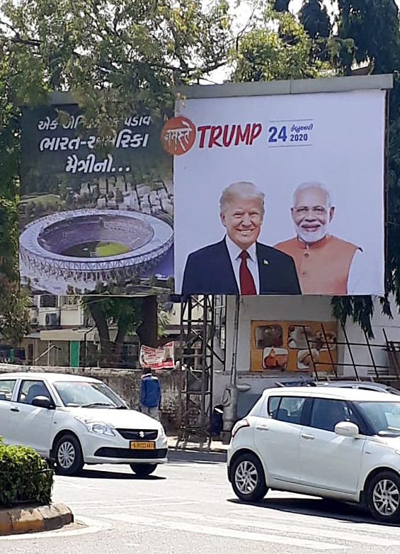 An artist makes graffiti showing a picture of USA President Donald Trump