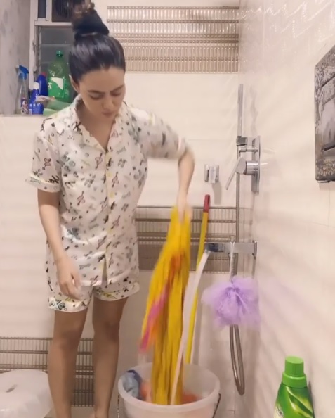 Sana Khaan Washing Clothes
