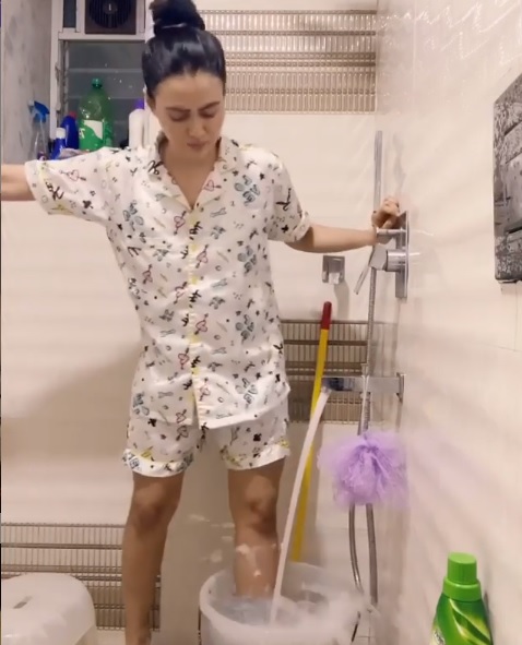 Sana Khaan Washing Clothes