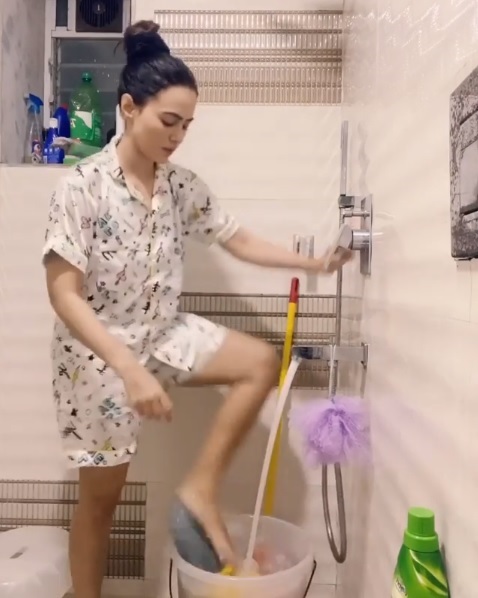 Sana Khaan Washing Clothes