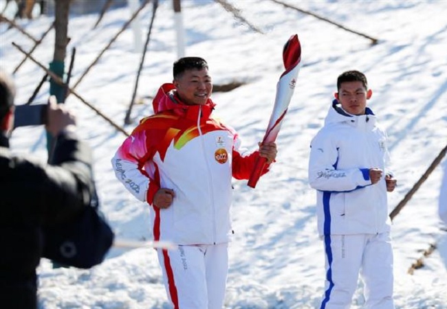 torch in Winter Olympics